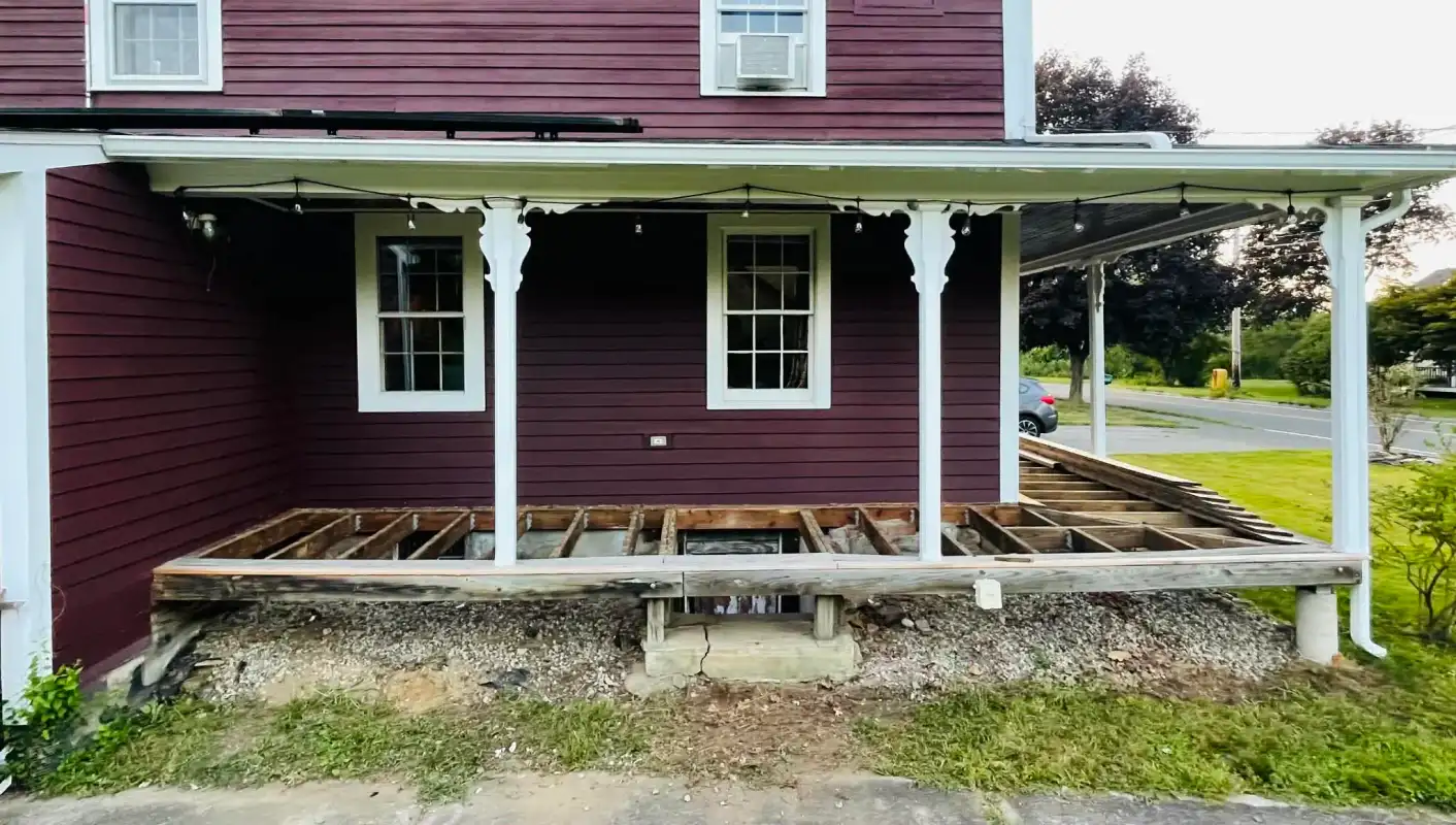 dark-house-new-porch-white-trim-before.webp