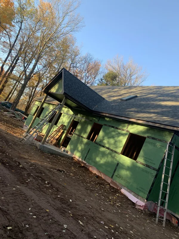 house-under-construction-sheetrock-roof-after.webp
