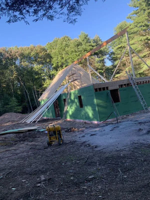 house-under-construction-sheetrock-roof-before.webp