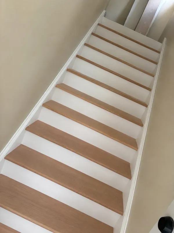 modern-staircase-wood-treads-risers-after.webp