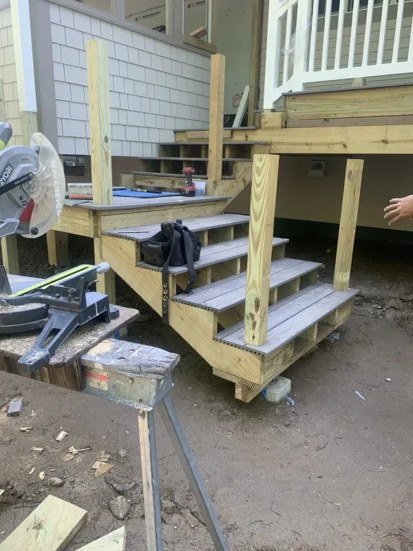 new-deck-stairs-white-railings-before.webp