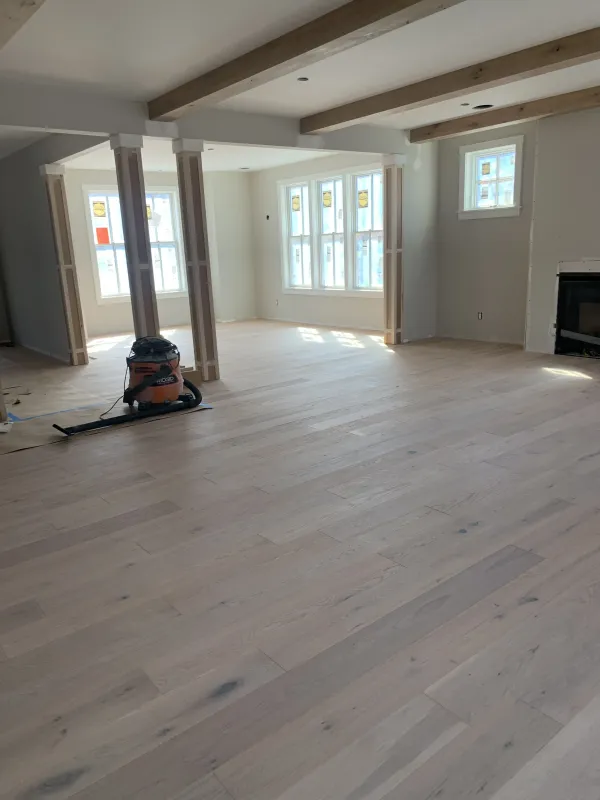 new-hardwood-floor-home-interior-after.webp