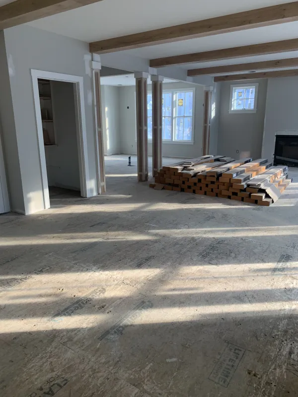 new-hardwood-floor-home-interior-before.webp