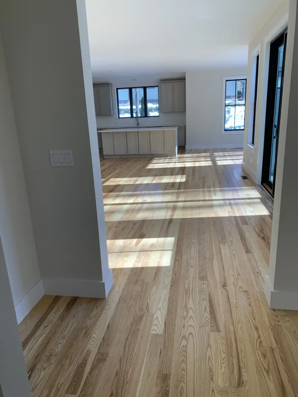 new-hardwood-floors-modern-home-after.webp