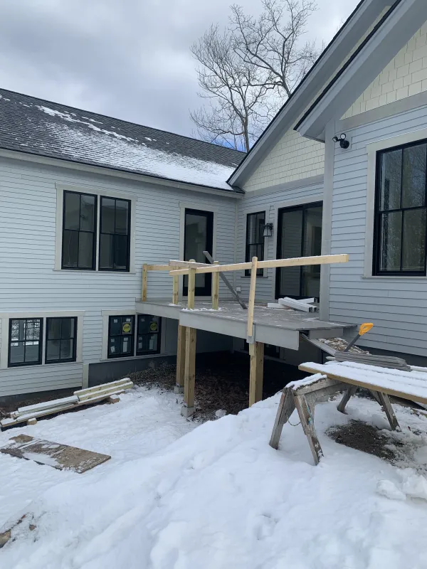 new-home-siding-deck-snow-before.webp