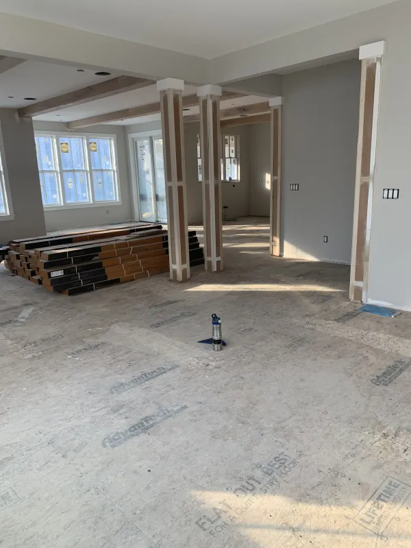 under-construction-interior-flooring-framing-after.webp
