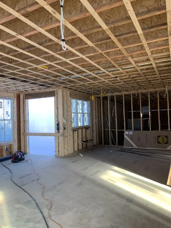 under-construction-interior-flooring-framing-before.webp
